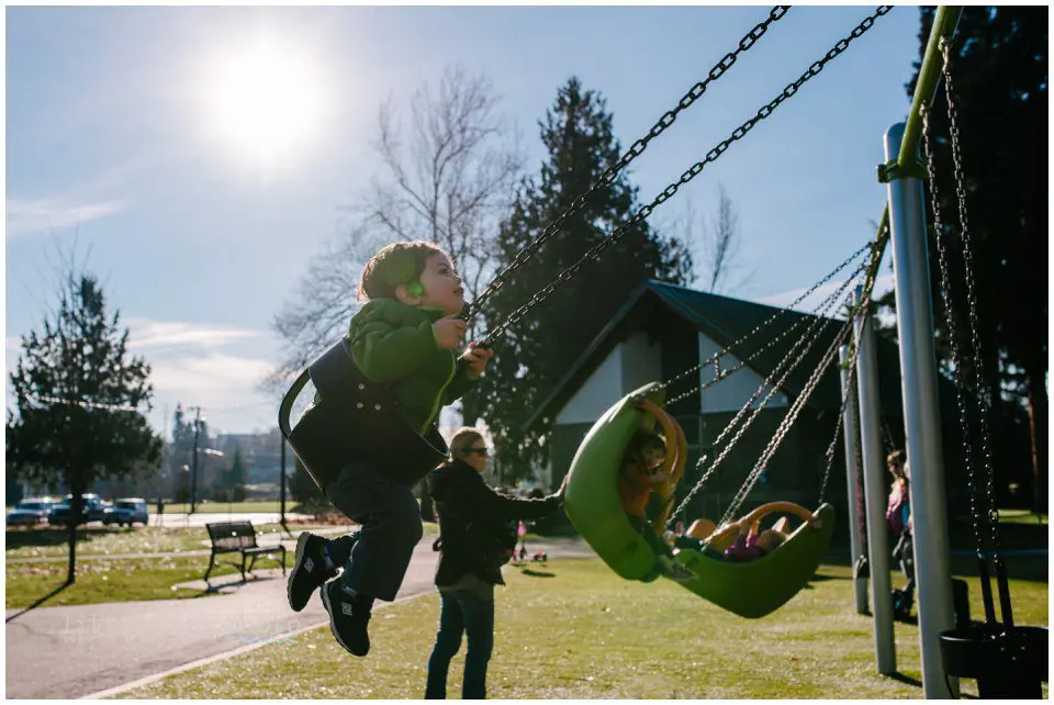 little boy on swing - Kitsap Documentary Family Photographer