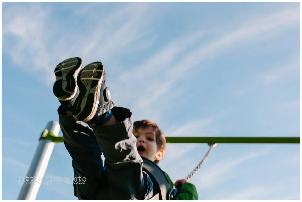 little boy on swing - Kitsap Documentary Family Photographer