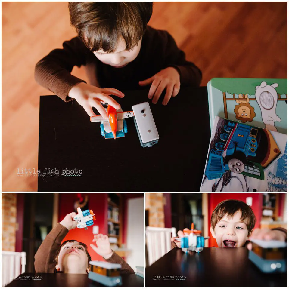 boy plays with planes and trains - Kitsap Documentary Family Photographer