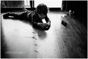 trains and puddles on floor - Kitsap Lifestyle Photographer