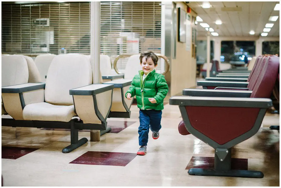 boy running on ferry