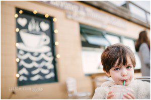 little boy drinks chocolate milk - family documentary photography