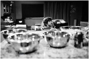 child watching meal prep - Family documentary photography