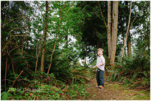 little boy running through woods - Poulsbo storytelling photographer