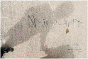kids shadows on sidewalk - family documentary photography