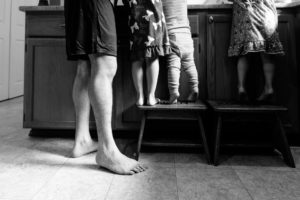 families feet at counter