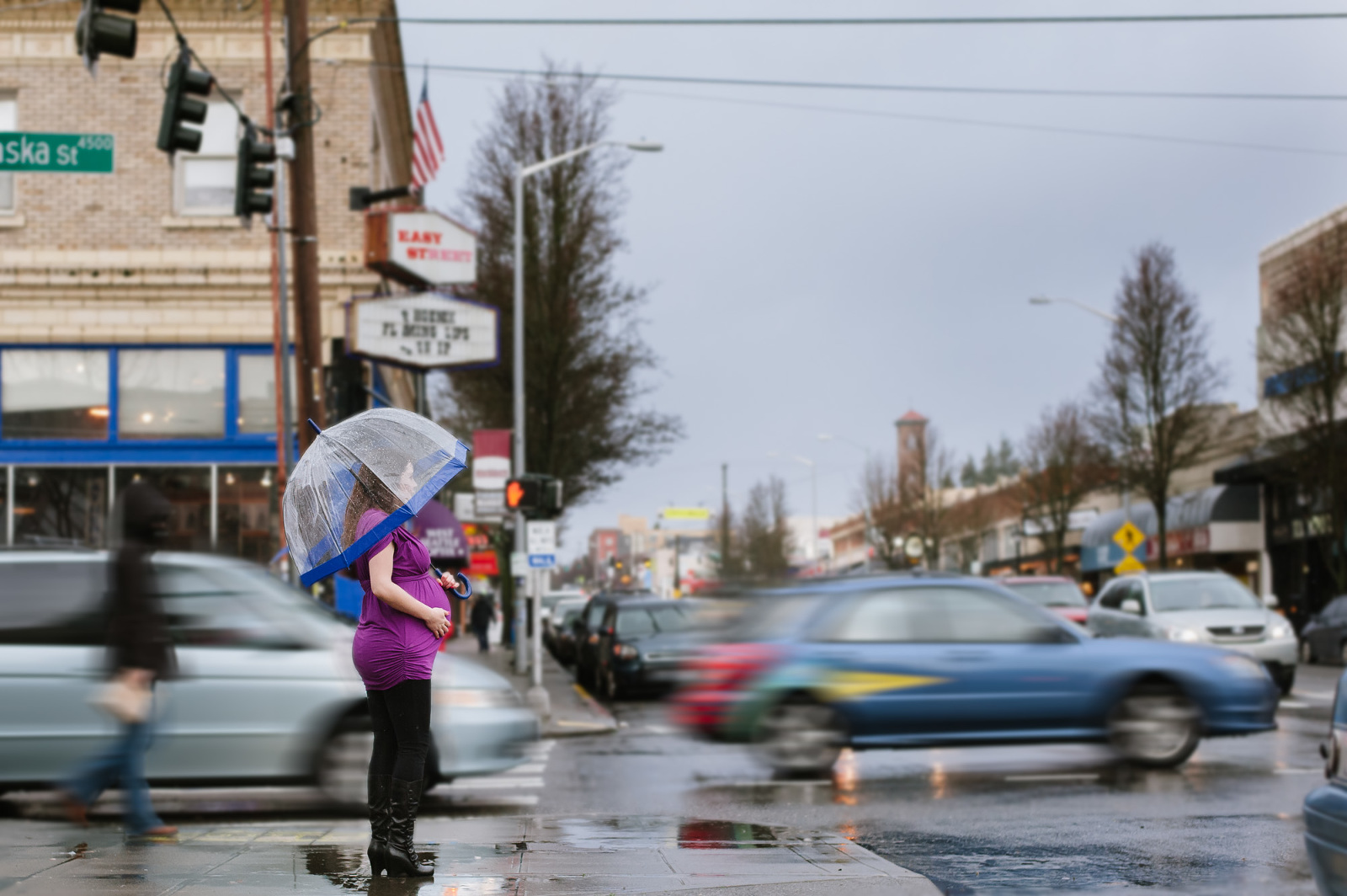 Pregnant woman at street corner