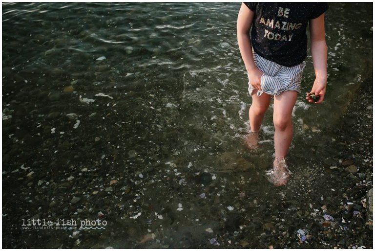girl wading through water - family storytelling photography