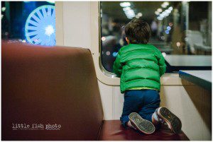 boy looks out window on late ferry