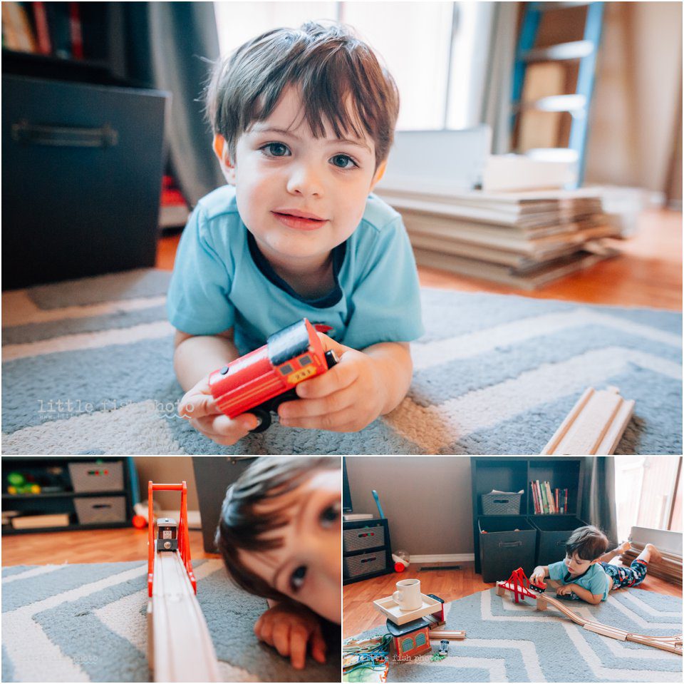 boy plays with trains