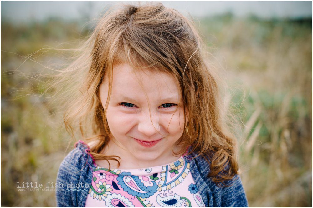 little girl makes face