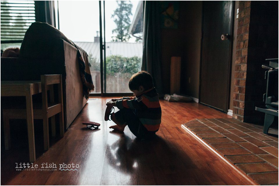 boy putting on shoes