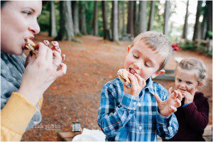 family eats smores