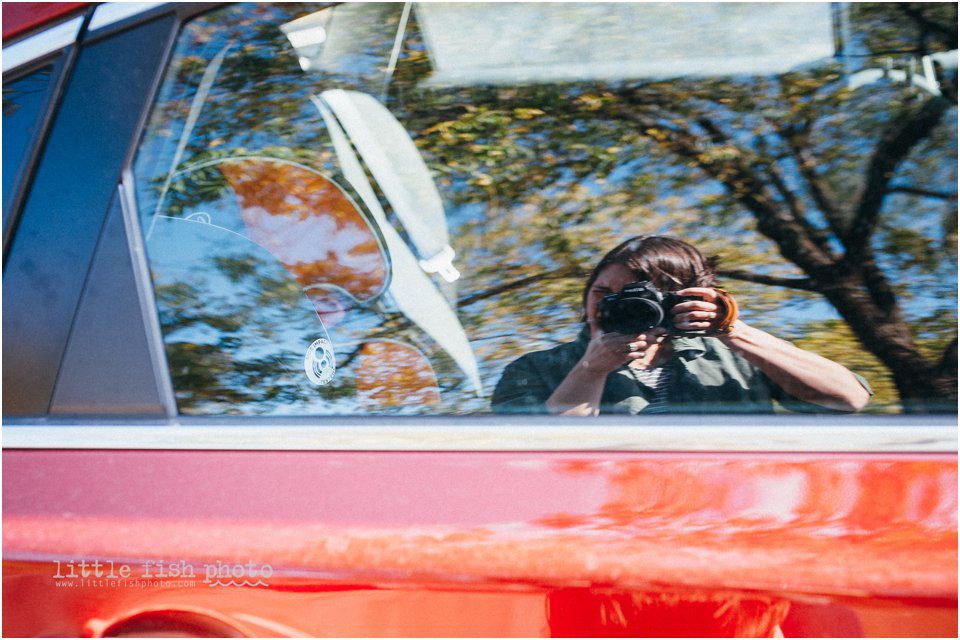 selfie in car window reflection