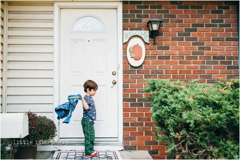 boy on doorstep