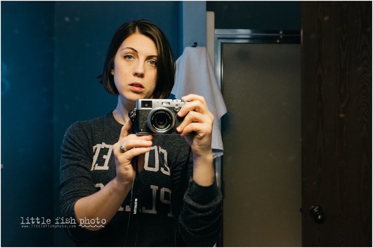self portrait in bathroom mirror