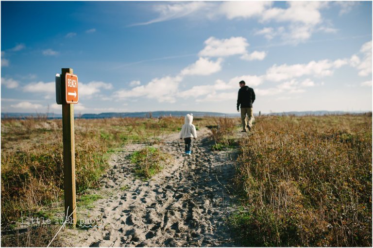 father and son take a walk on the beach - lessons from a year of day in the life shooting