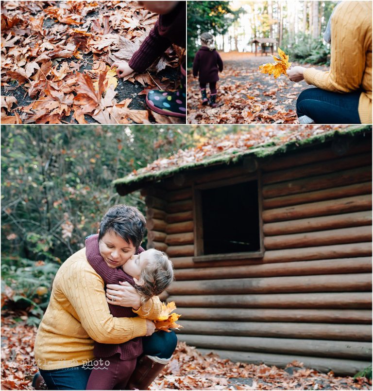 daughter collects fallen leaves from mom