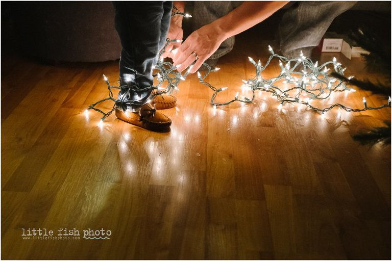 child's feet wrapped in christmas lights - Sham of the perfect