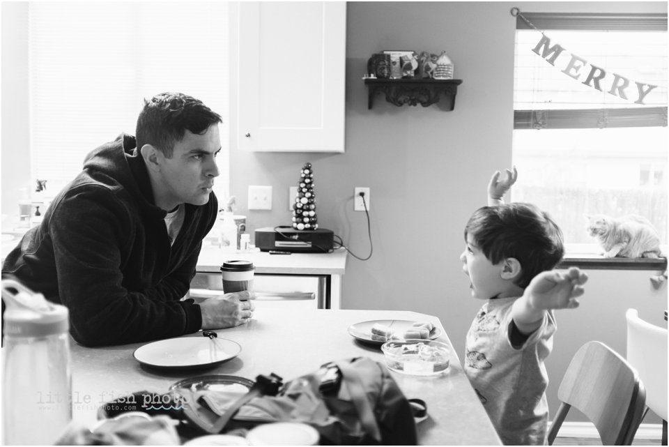 Dad and son have animated lunch conversation