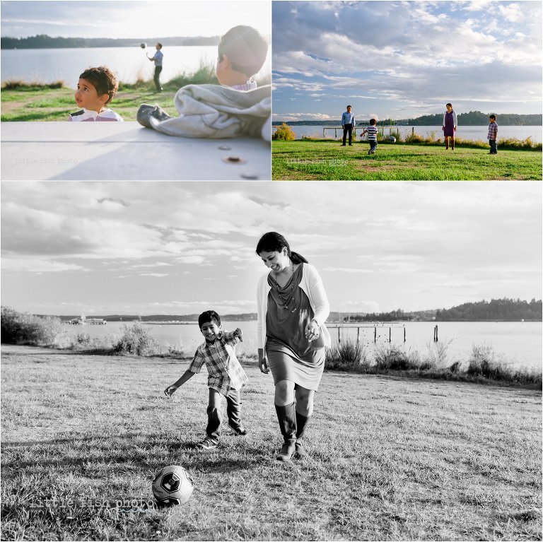 family with two young boys plays soccer