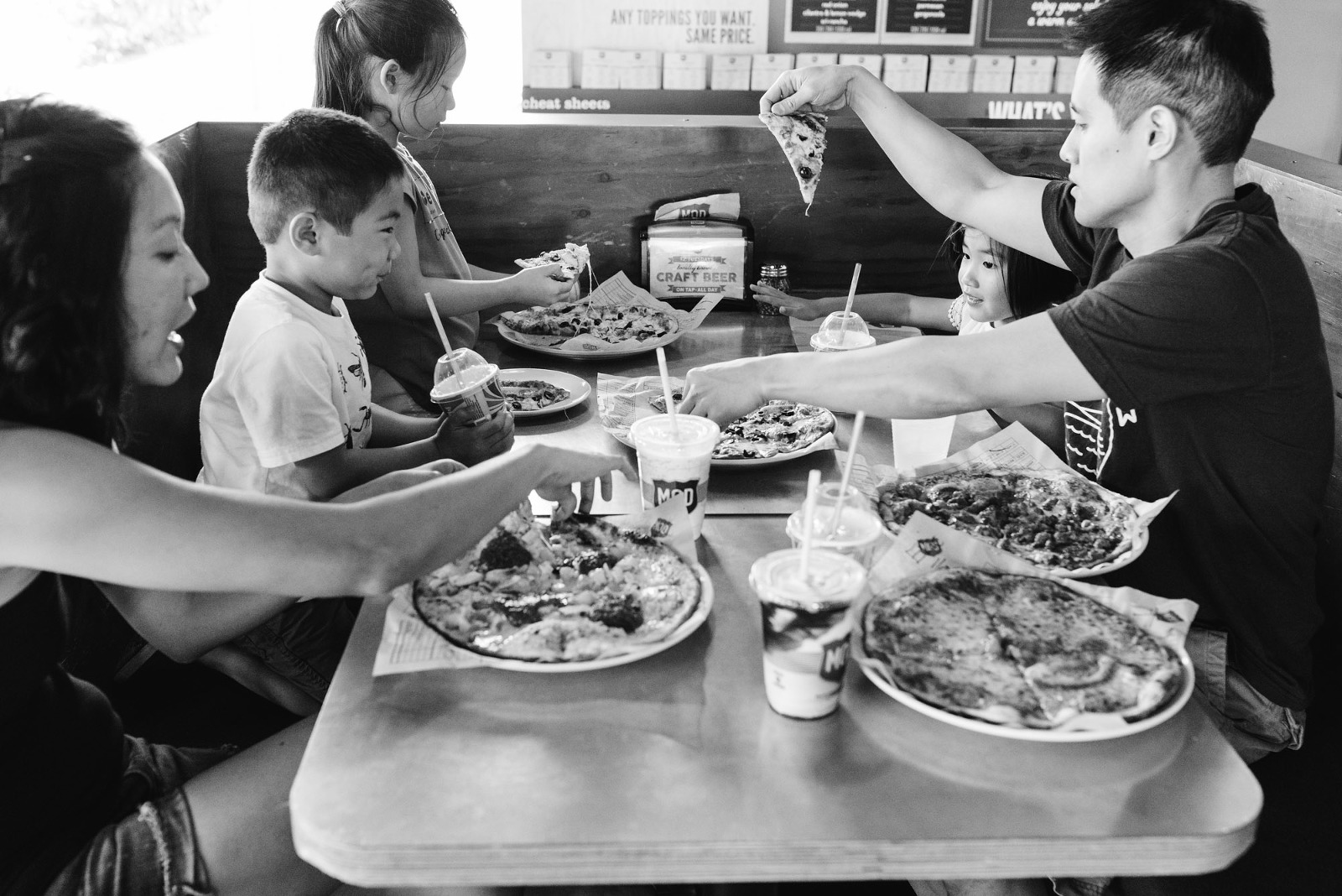 family eating pizza