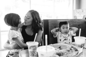 family at pizza restaurant