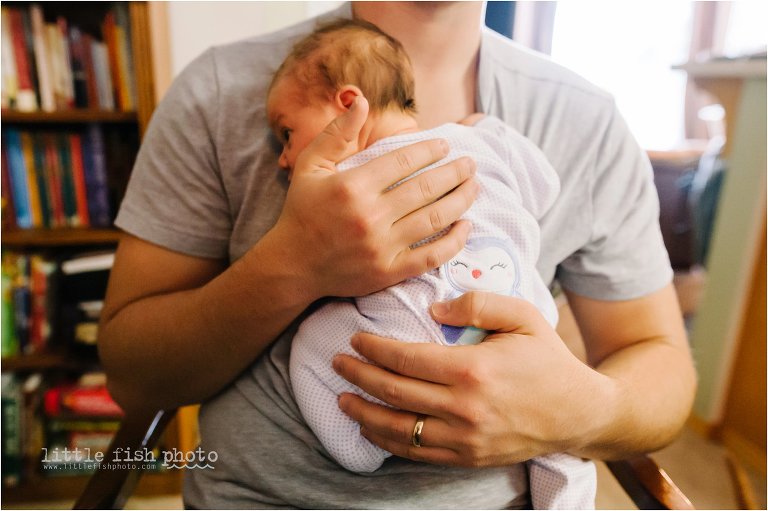 father holds baby on chest - Bainbridge Island documentary baby photographer