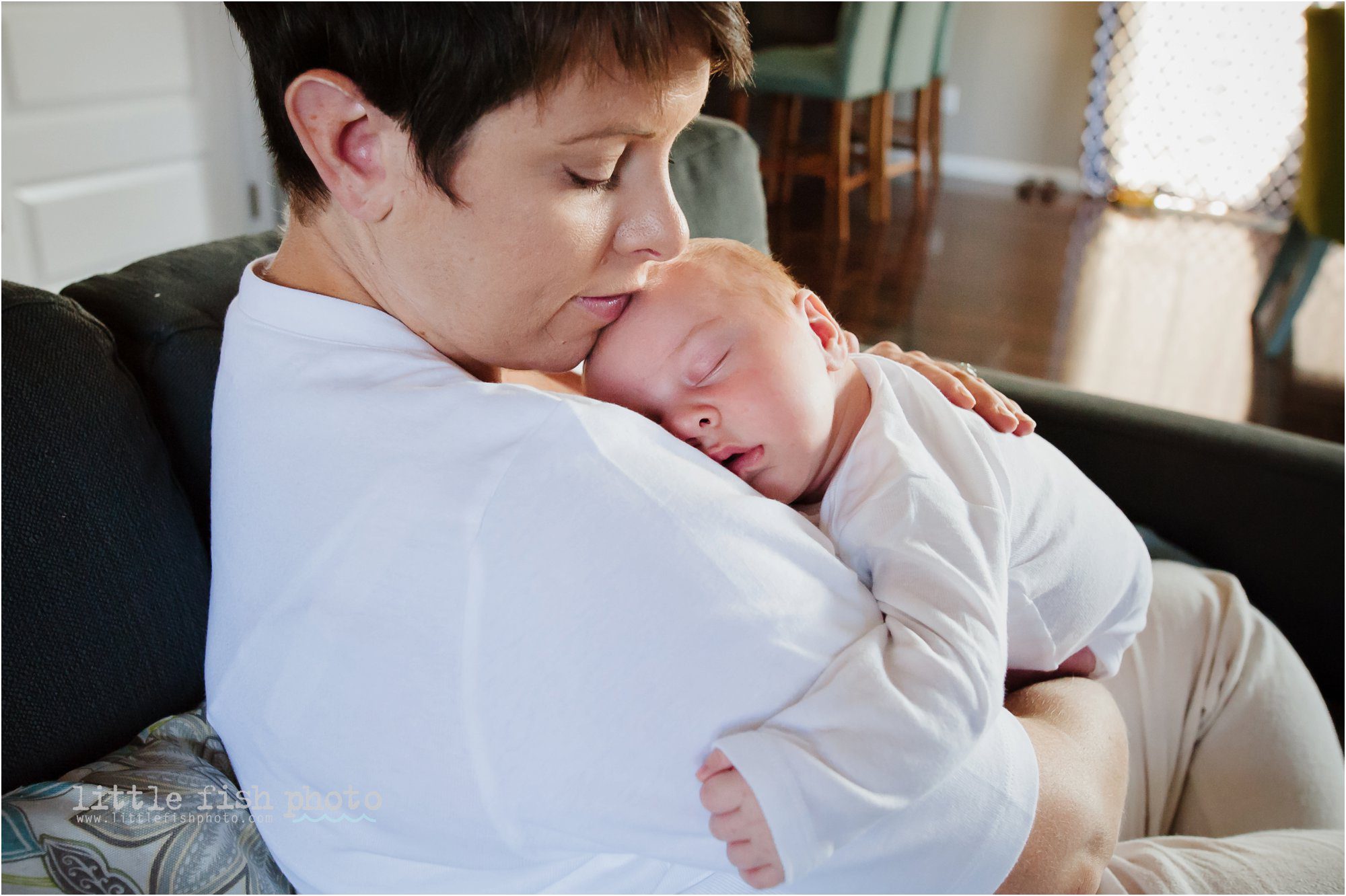 mother holds baby boy - Poulsbo Lifestyle Newborn Photographer
