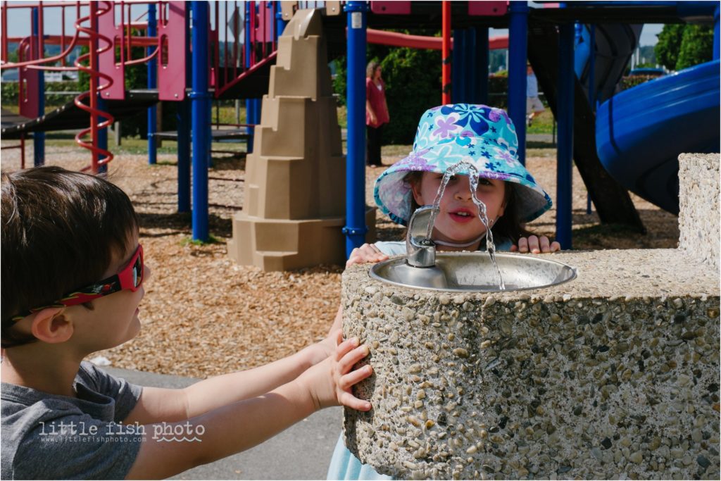 kids at water fountain - day-in-the-life-poulsbo-documentary-family-photographer