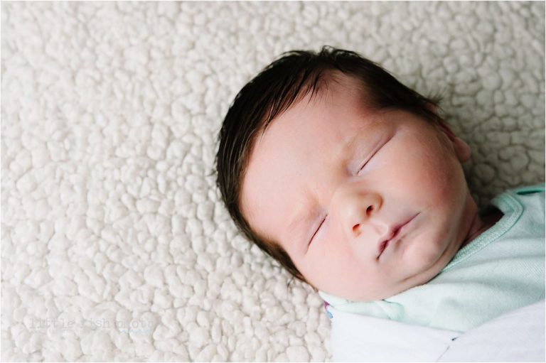 portrait of baby boy with full head of hair