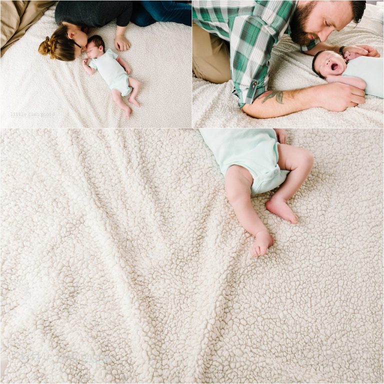 newborn boy on bed with mom and dad