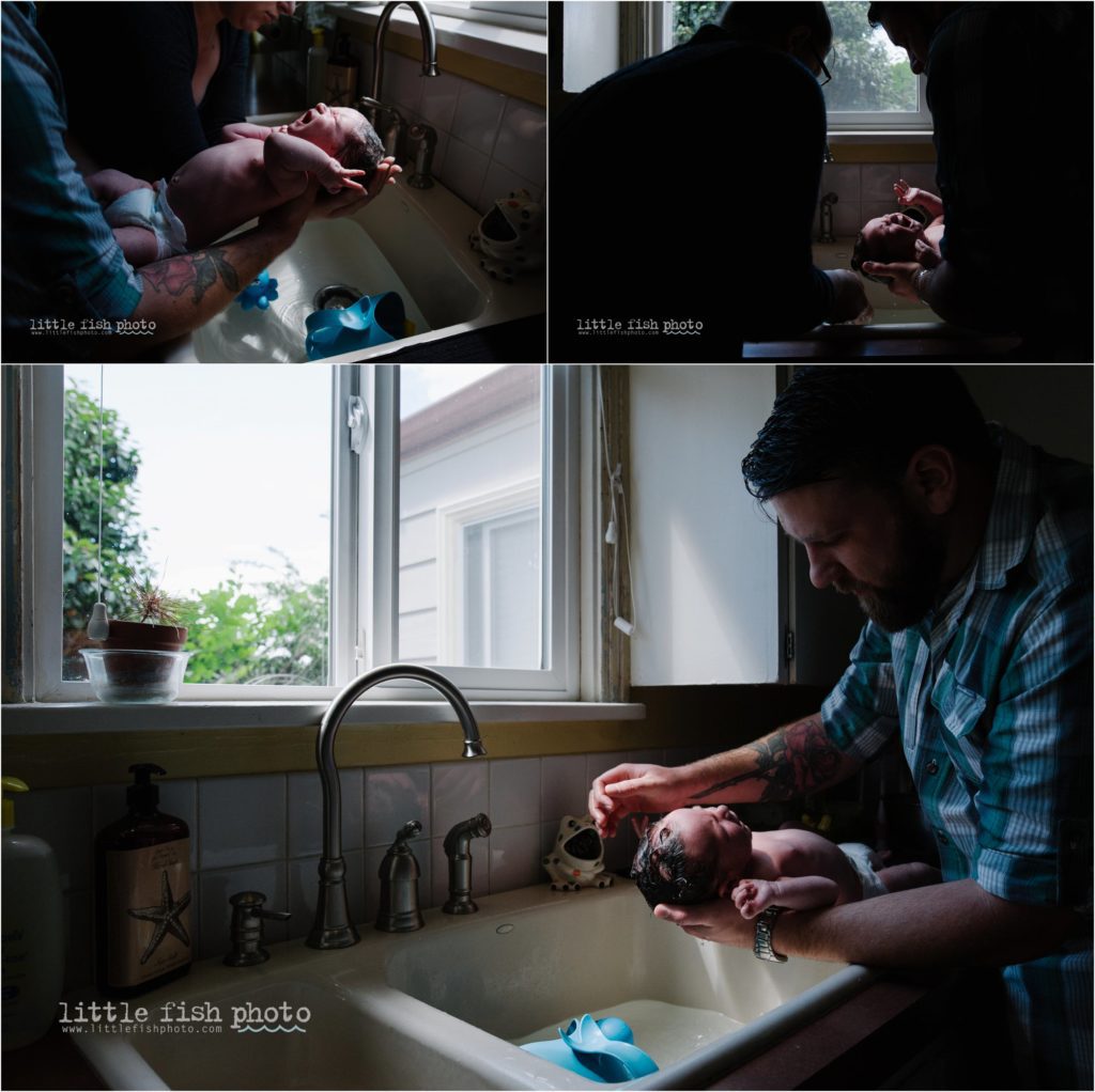 newborn baby boy takes sink bath