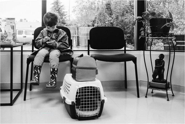 boy waits in vet's office - documentary family photography
