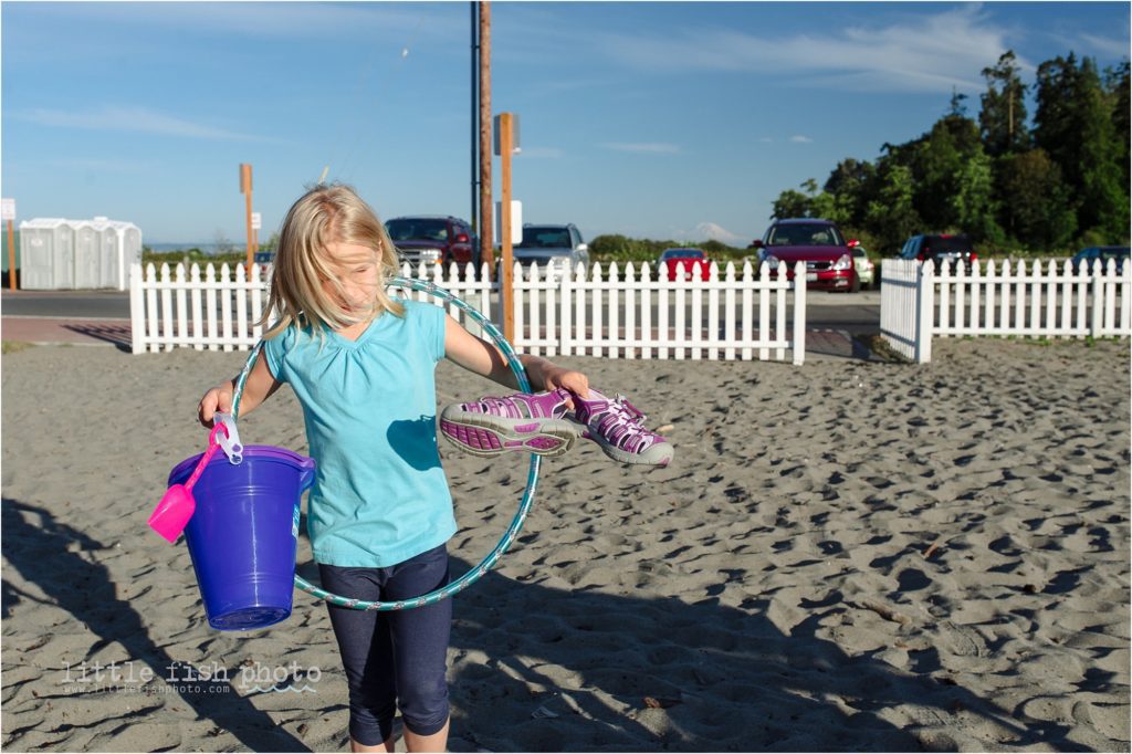 girl with buckets and hula hoop at the beach - Kitsap Lifestyle Family Photographer