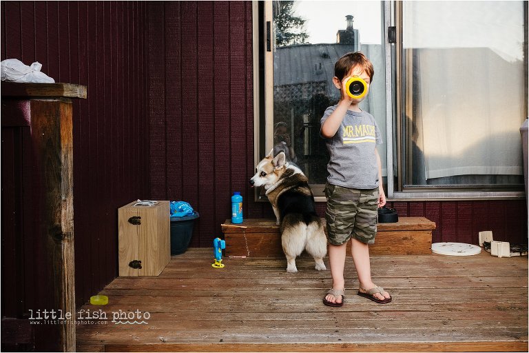 Boy on porch with dog - Kitsap Documentary Family Photographer