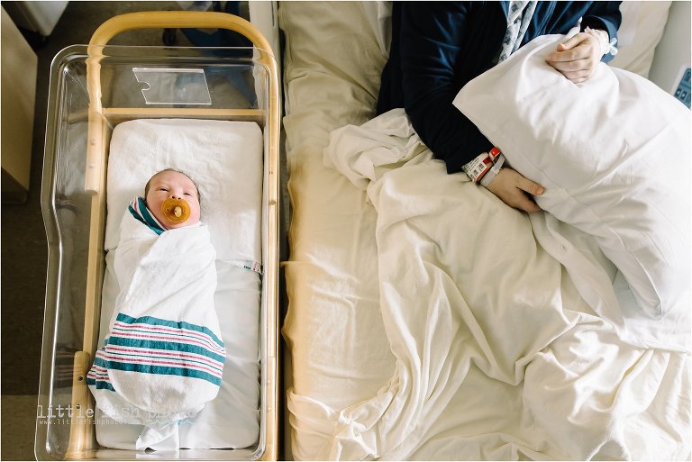 baby in bassinet - Kitsap Lifestyle Newborn Photographer in Hospital