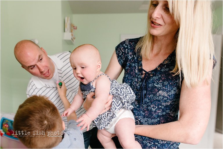 baby reaches for brother - Poulsbo Lifestyle Family Photographer