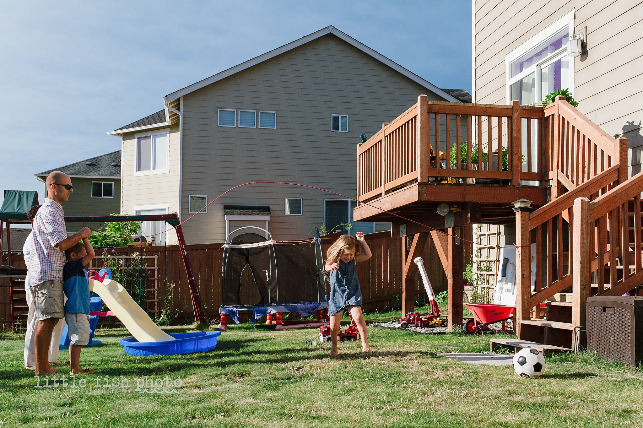 girl plays jump rope - Kitsap Lifestyle Newborn Photographer