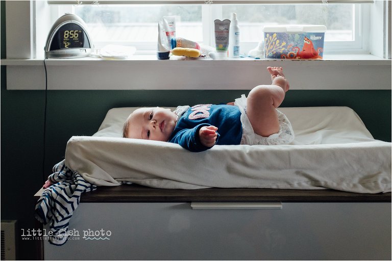 baby on changing table