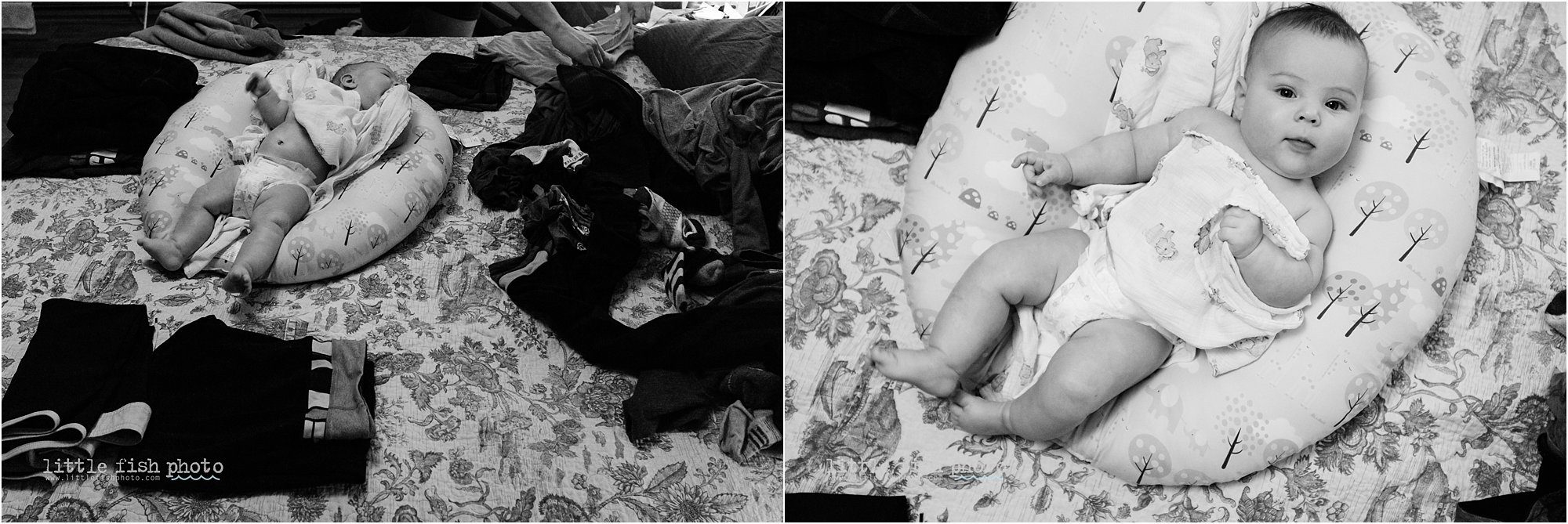 baby with laundry on bed