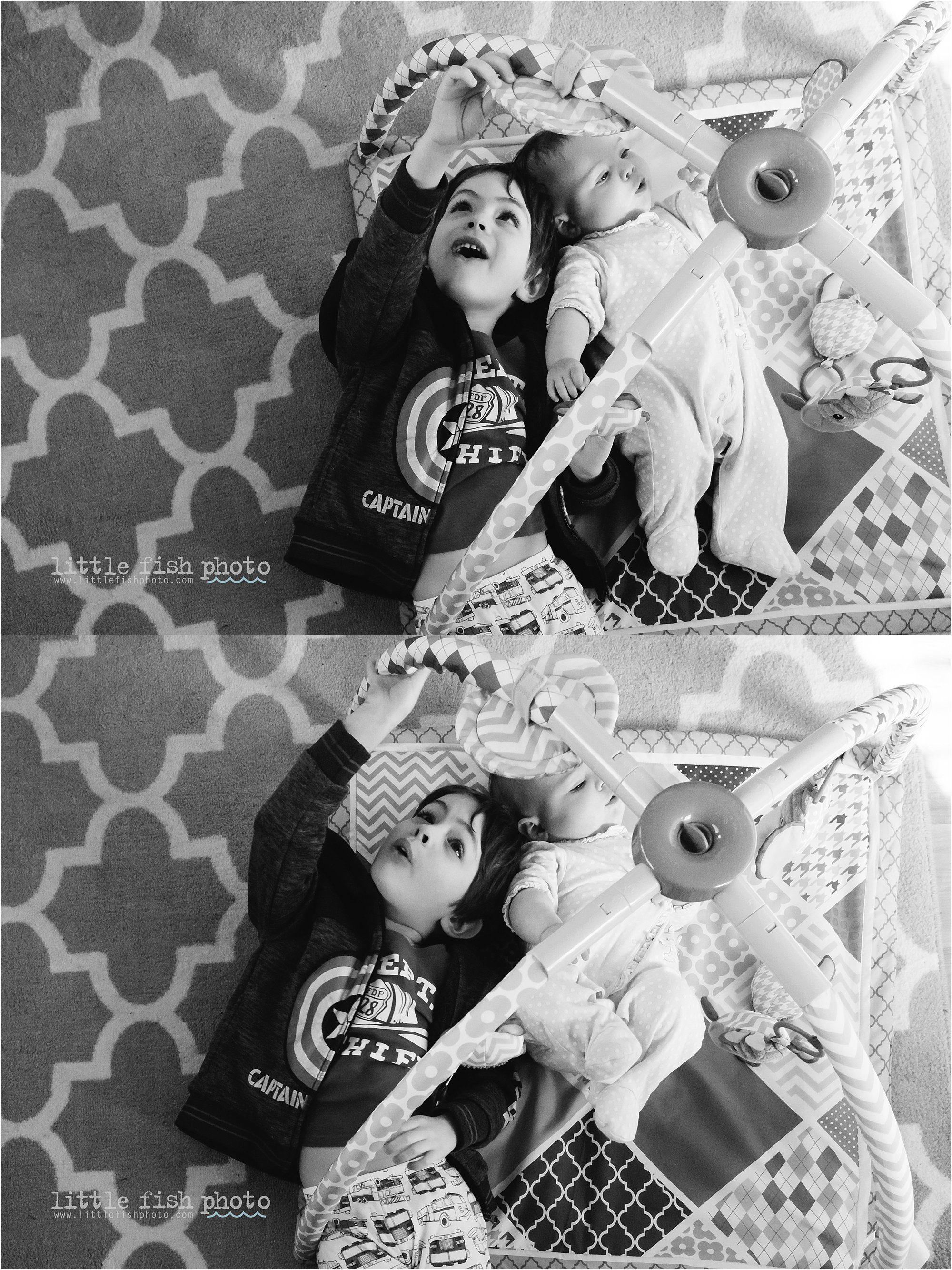 brother plays with baby sister on activity mat