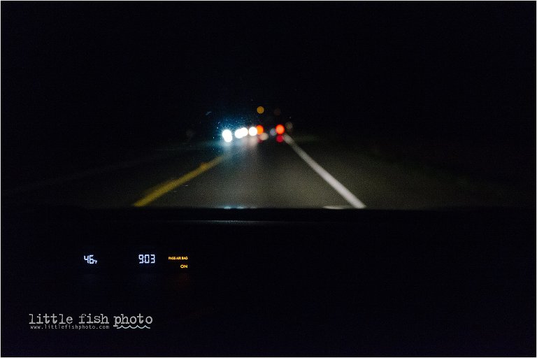 headlights on dark road