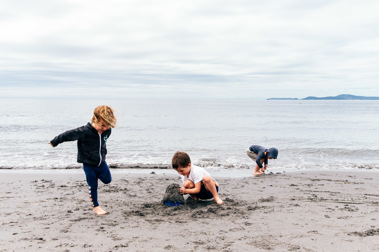 kids play on beach