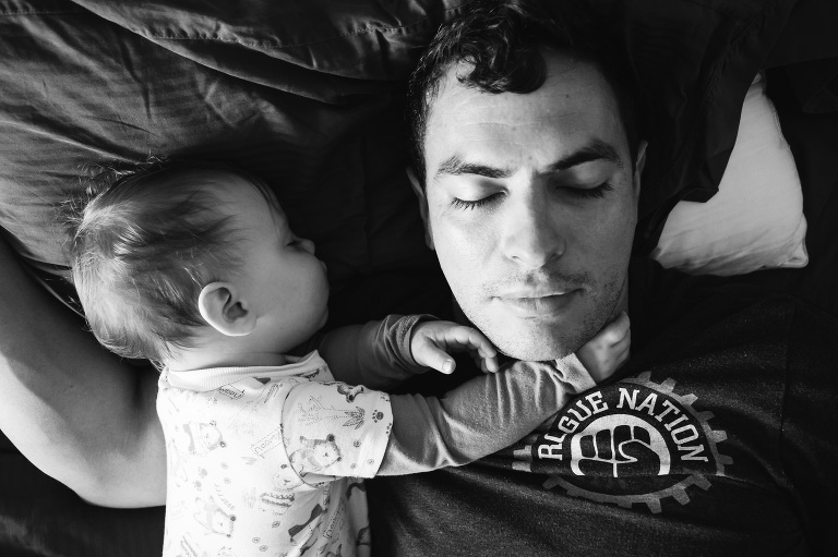 man asleep with baby