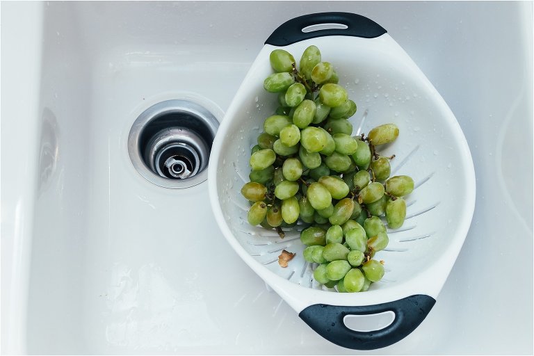grapes drying in collander - documentary family photography