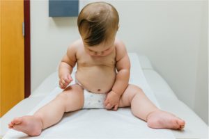 9 month old at Dr. office - documentary family photography
