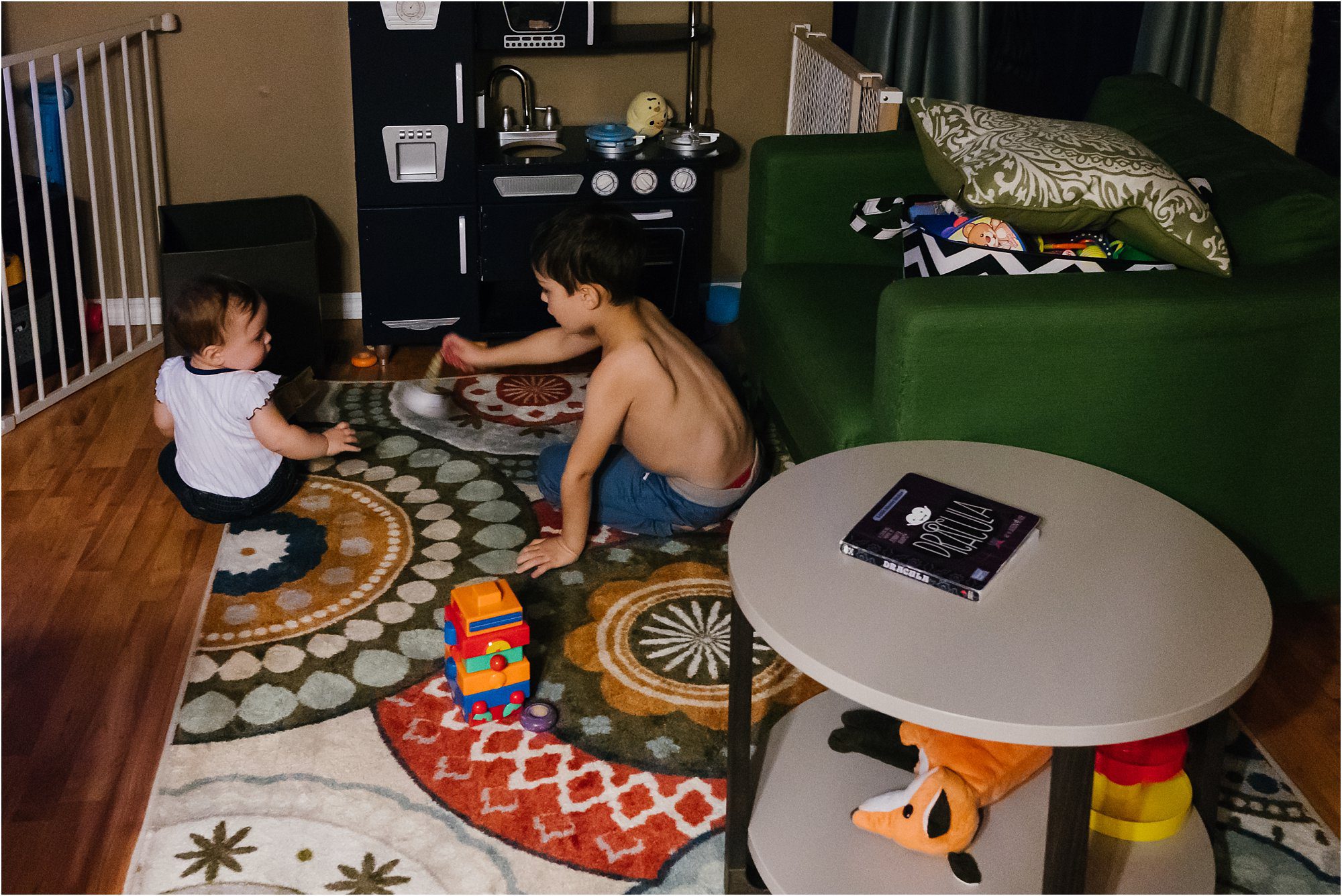 brother and sister play on floor- poulsbo documentary family photography