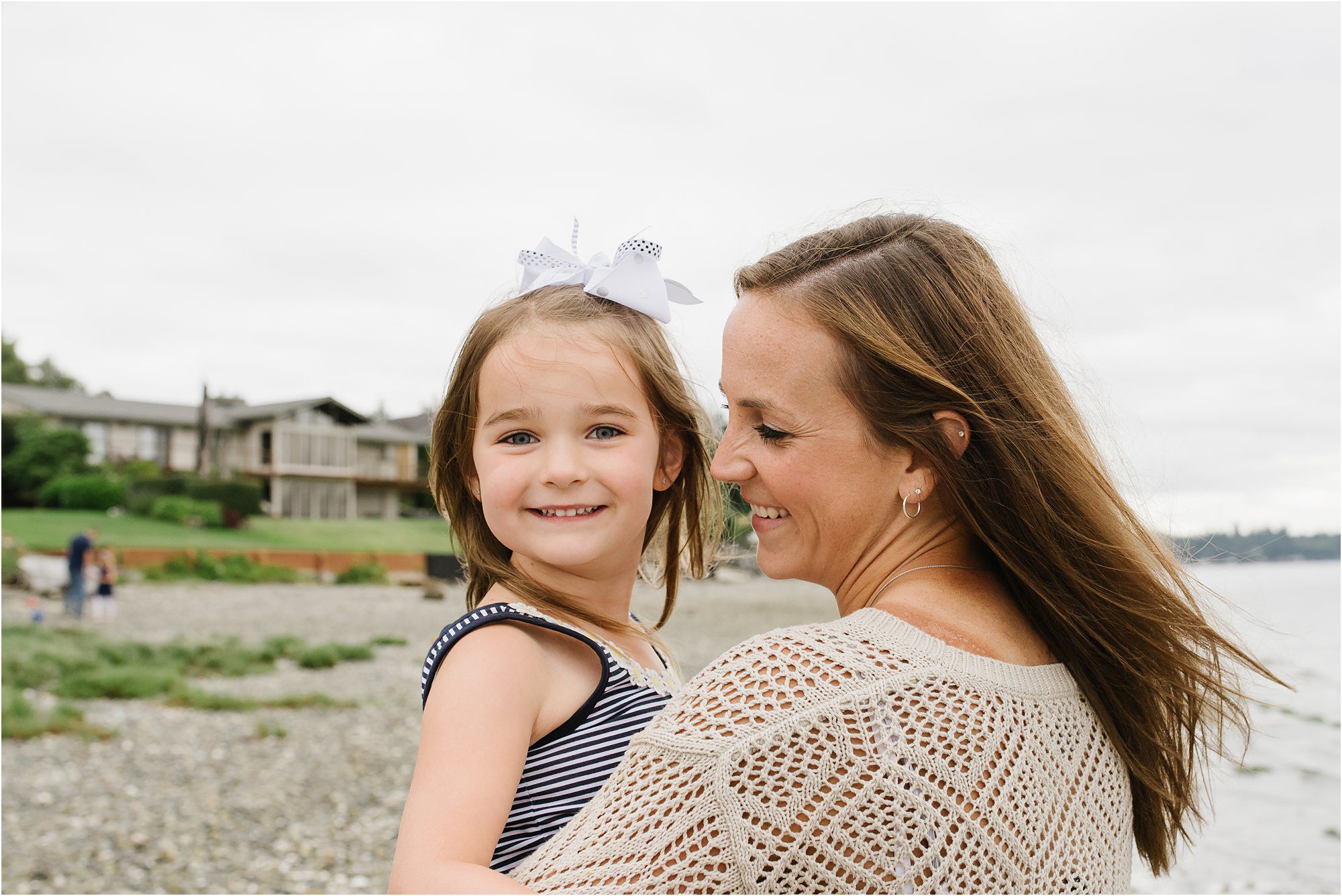 mom holds daughter