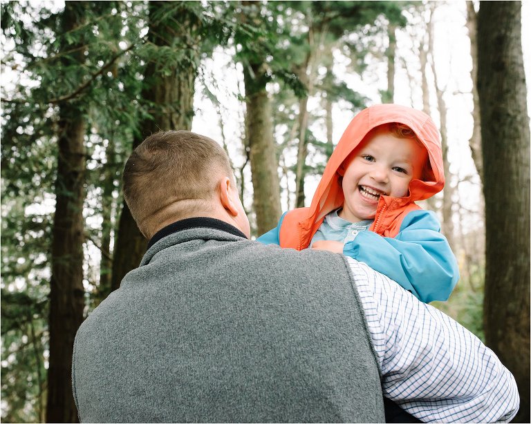 father throws son over shoulder - Kitsap Lifestyle Family Photographer